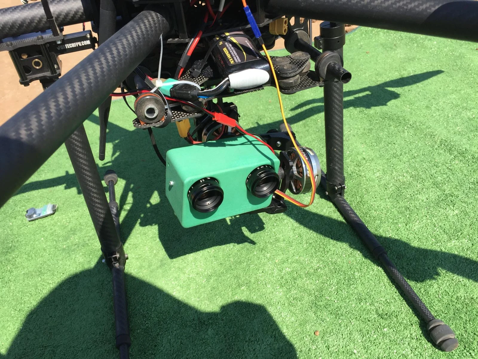 Custom sensor assembly mounted beneath a Terrascan drone